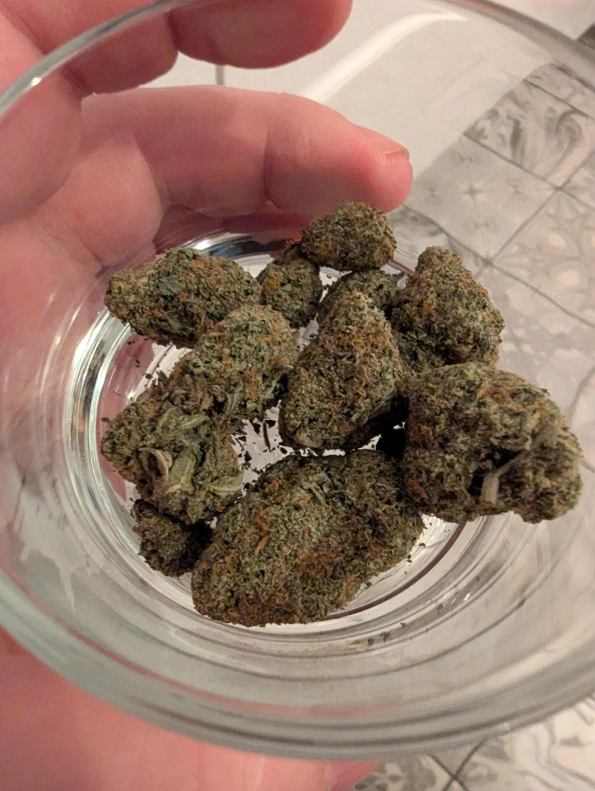Close-up of potent cannabis buds in a glass jar, perfect for Santa Magdalena De Pulpis social clubs.